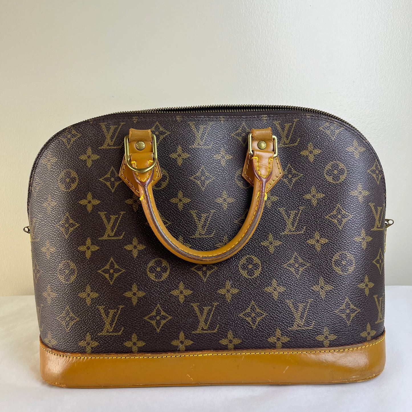 Louis Vuitton Alma PM Monogram Canvas – 9.4"H x 12.6"L x 6.3"W