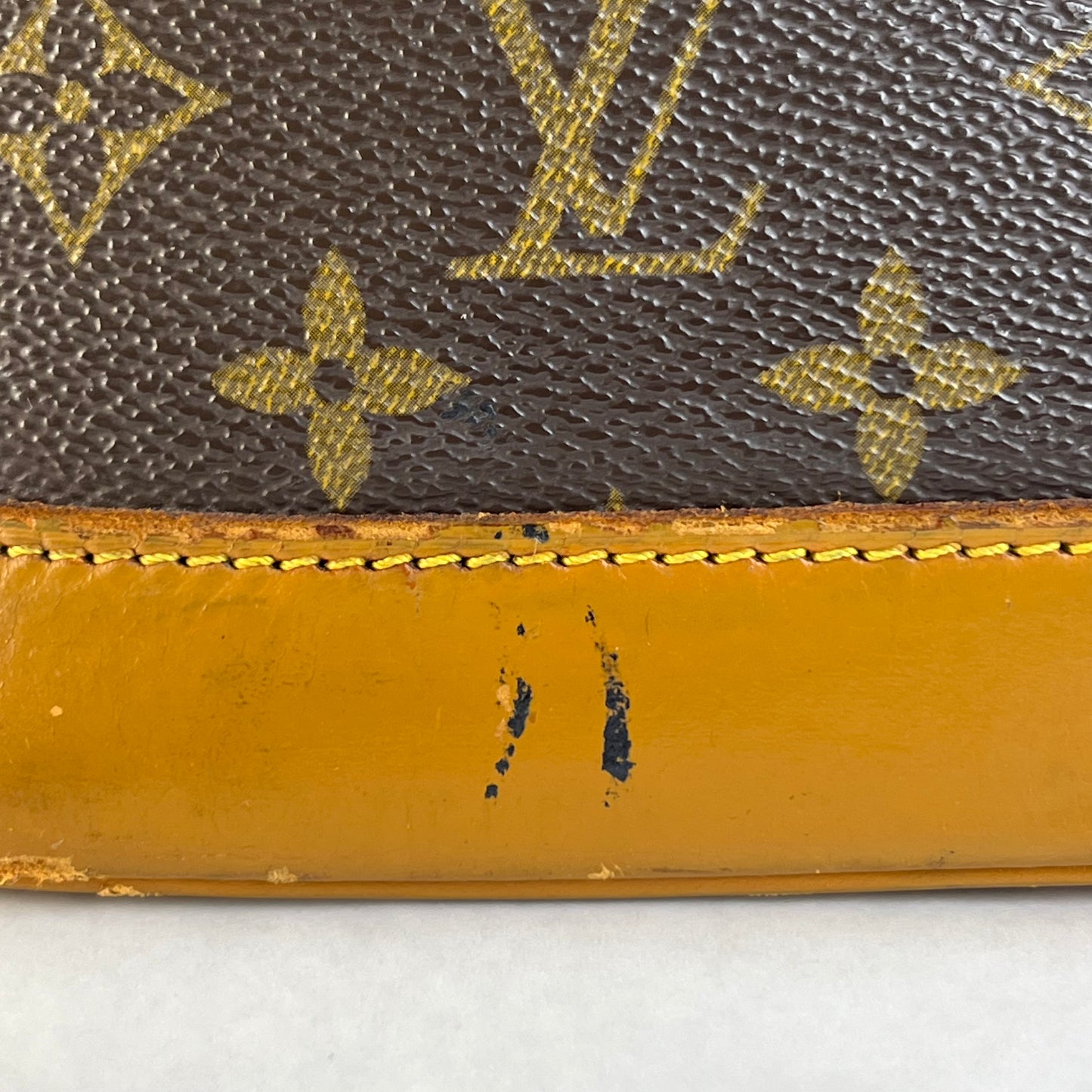 Louis Vuitton Alma PM Monogram Canvas – 9.4"H x 12.6"L x 6.3"W