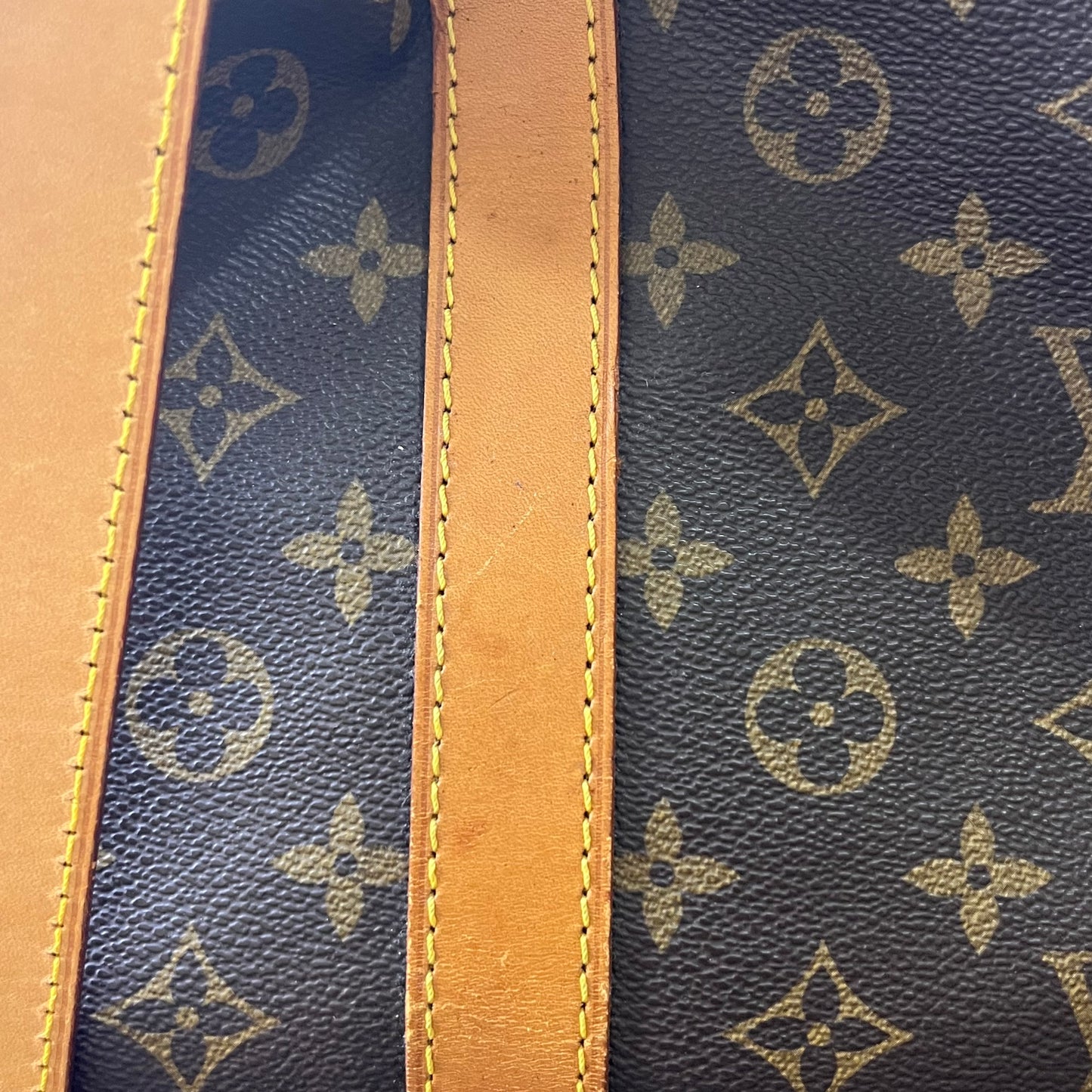 Louis Vuitton Keepall 55 Monogram Canvas – 11.8"H x 21.7"L x 9.4"W