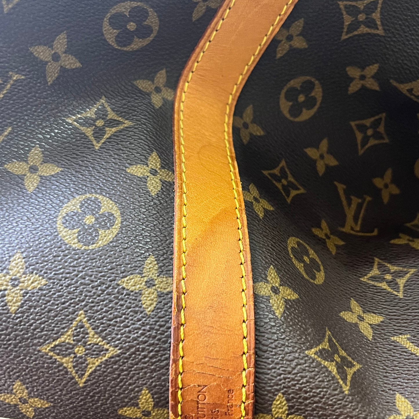 Louis Vuitton Keepall 55 Monogram Canvas – 11.8"H x 21.7"L x 9.4"W