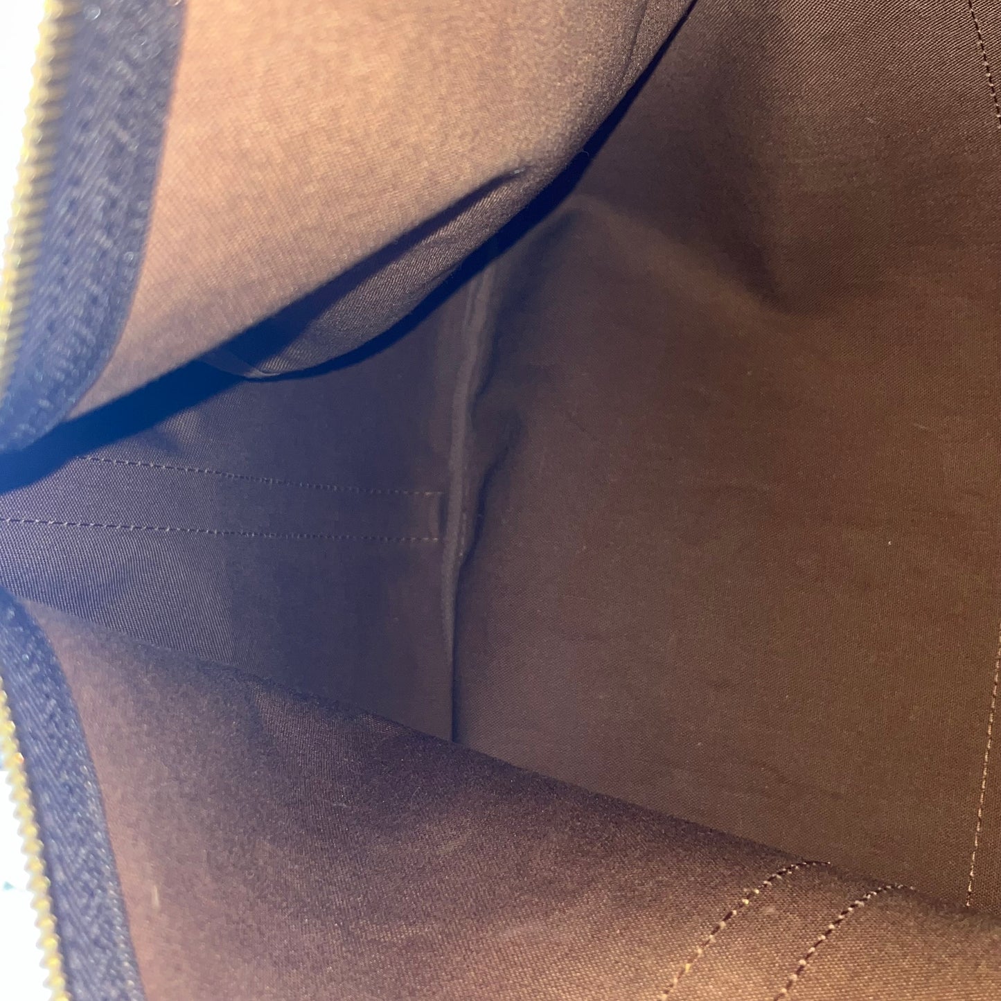 Louis Vuitton Keepall 55 Monogram Canvas – 11.8"H x 21.7"L x 9.4"W