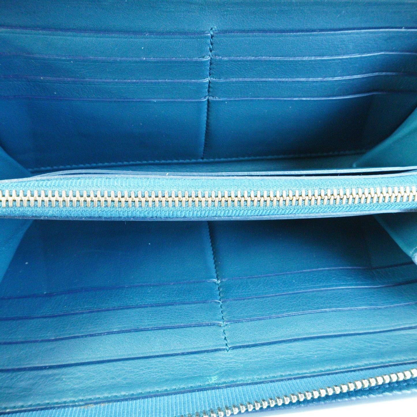 Tiffany & Co. Wave Embossed Leather Continetal Zip Blue Wallet