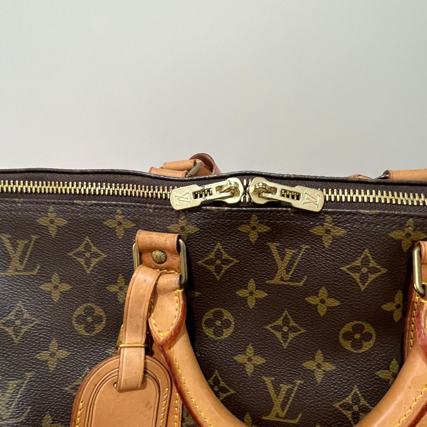 Louis Vuitton Keepall 60 Monogram Canvas – 13"H x 23.6"L x 10.2"W