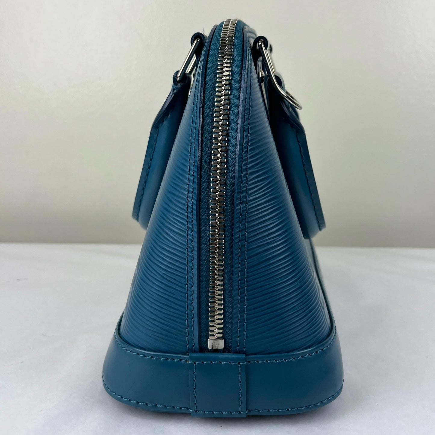 Louis Vuitton Alma BB Epi Teal β 6.7"H x 9.8"L x 4.7"W