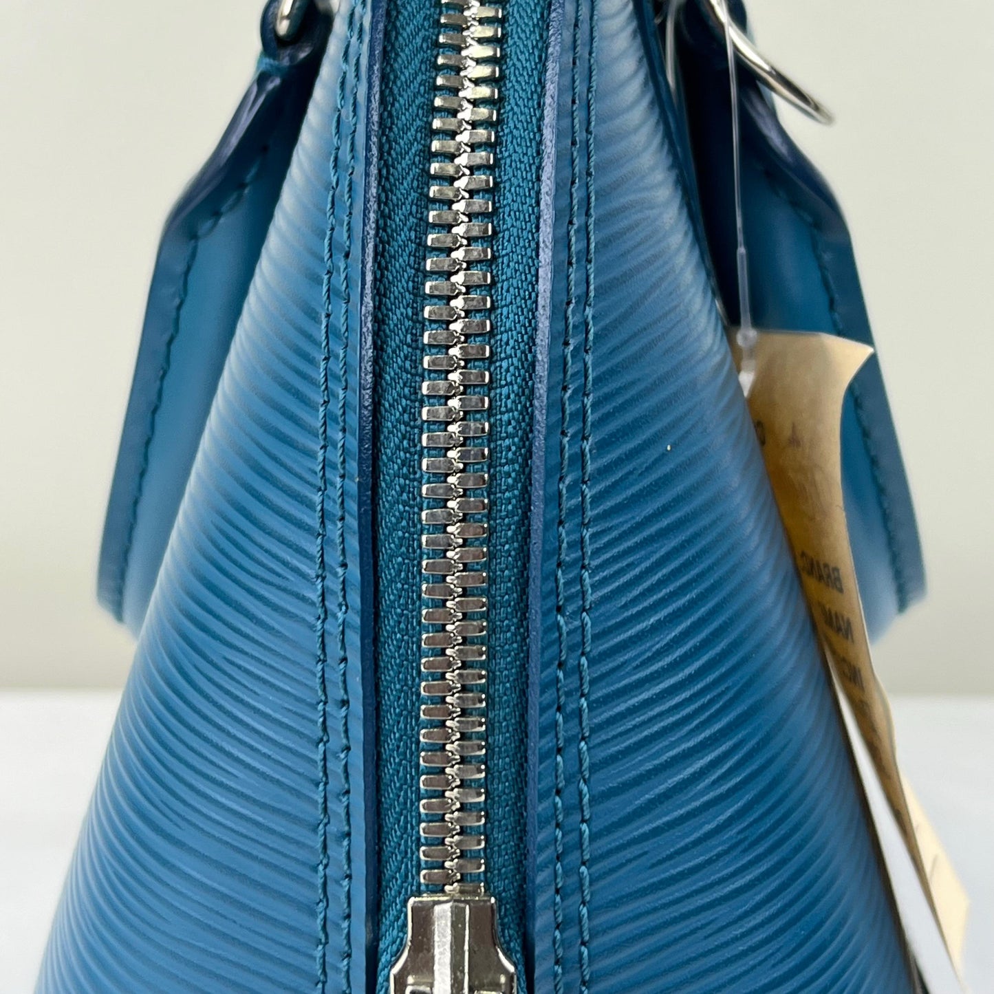 Louis Vuitton Alma BB Epi Teal β 6.7"H x 9.8"L x 4.7"W
