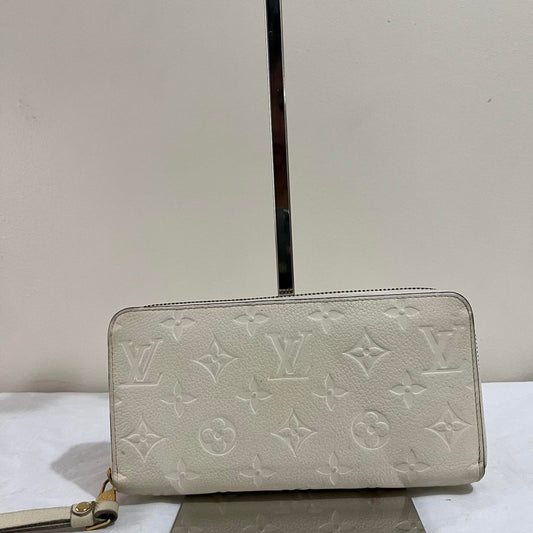 Louis Vuitton Zippy Wallet Empreinte White – 4.1"H x 7.7"L x 1"W