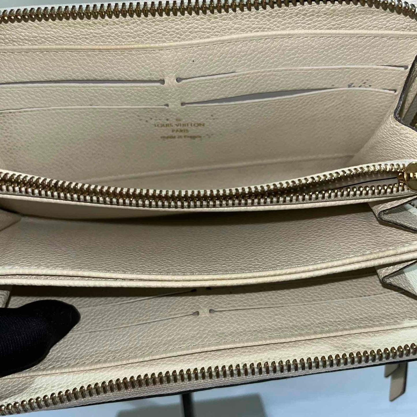 Louis Vuitton Zippy Wallet Empreinte White β 4.1"H x 7.7"L x 1"W