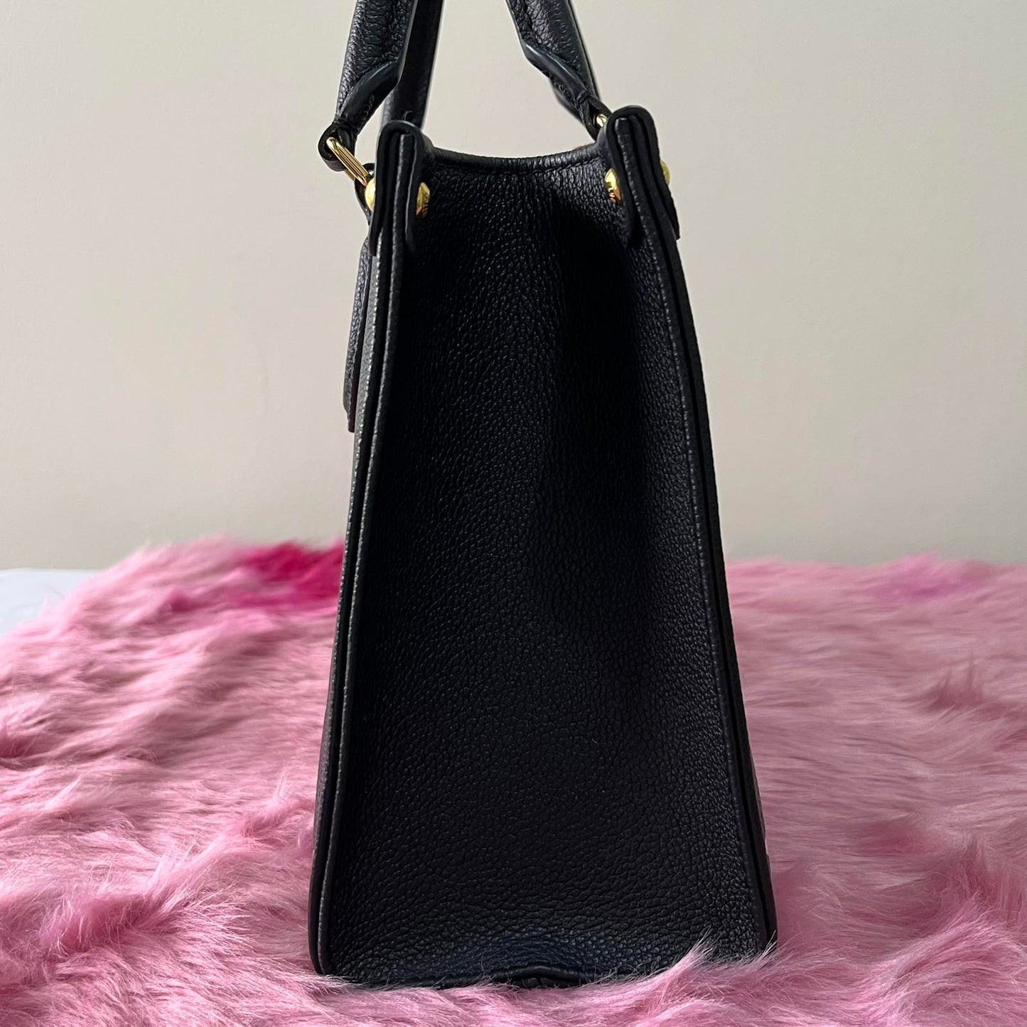 Louis Vuitton OnTheGo PM Black β 6.3"H x 9.8"L x 4.7"W