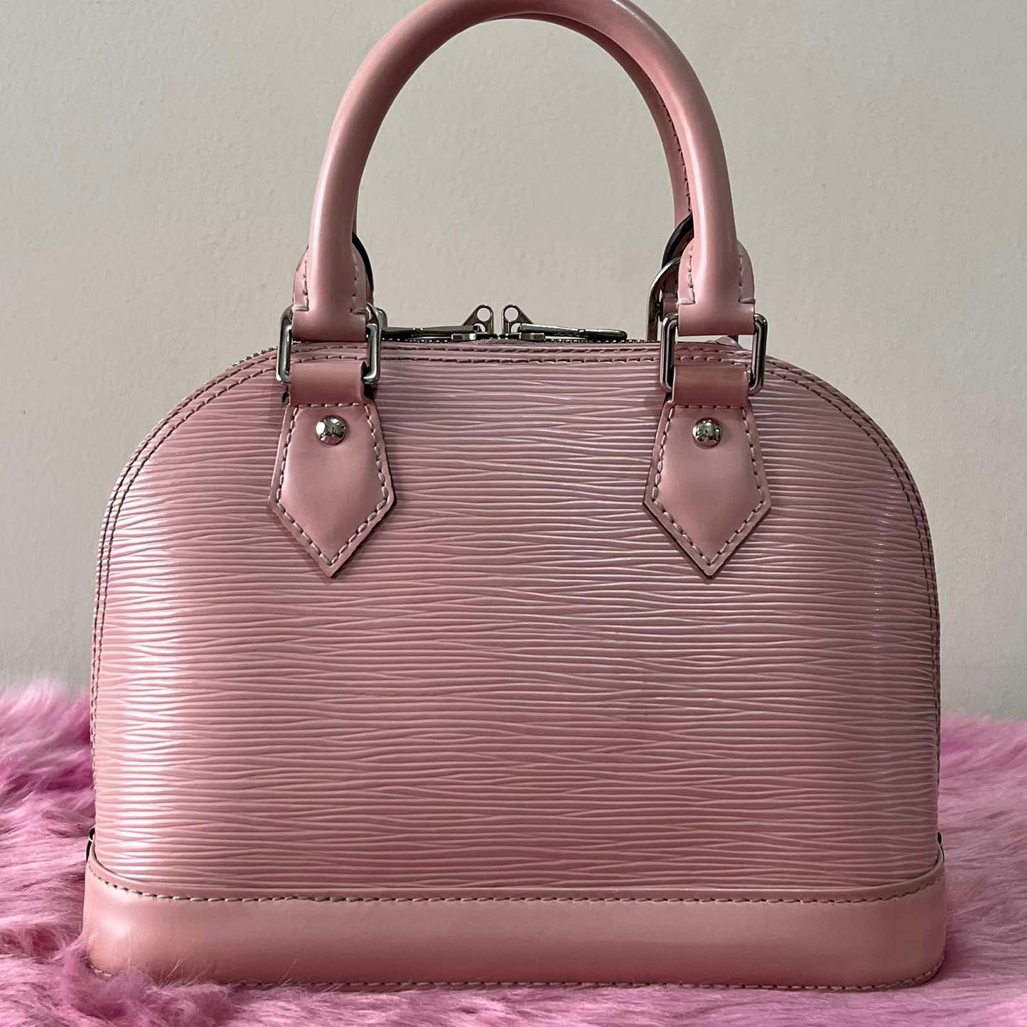 Louis Vuitton Alma BB Epi Pink β 6.7"H x 9.8"L x 4.7"W