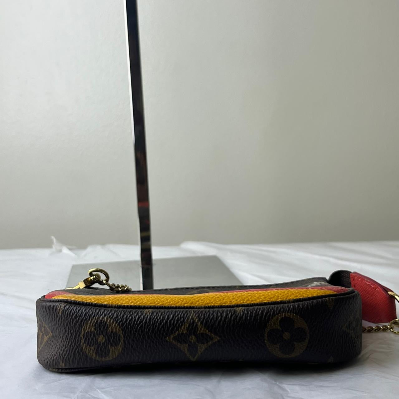 Louis Vuitton	Mini Pochette Printed