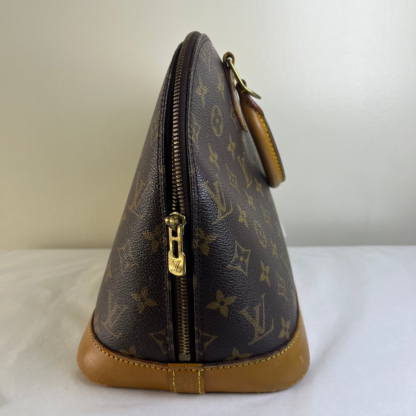 Louis Vuitton Alma PM Monogram Canvas – 9.4"H x 12.6"L x 6.3"W