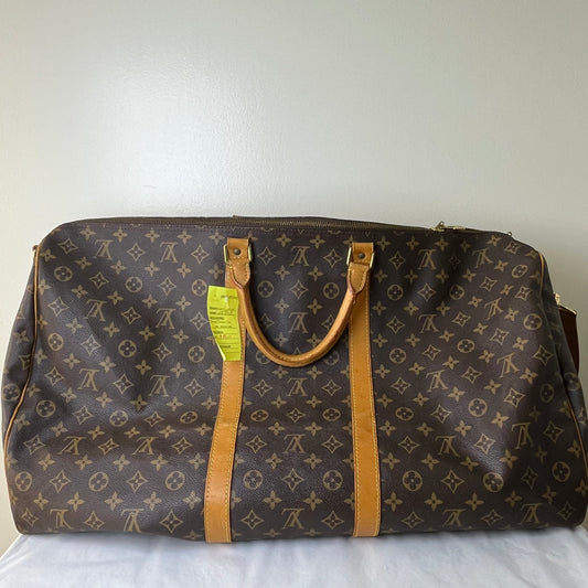 Louis Vuitton Keepall 55 Monogram Canvas – 11.8"H x 21.7"L x 9.4"W