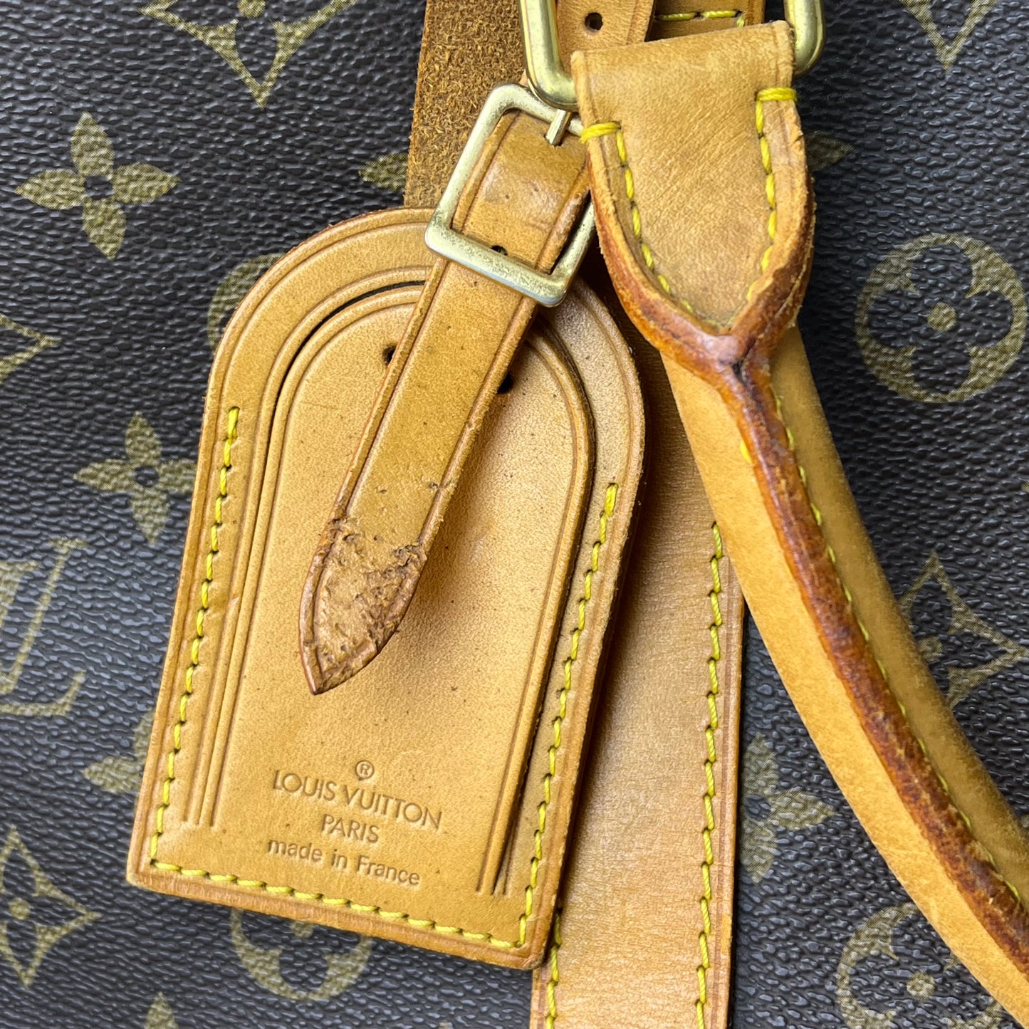 Louis Vuitton Keepall 55 Monogram Canvas – 11.8"H x 21.7"L x 9.4"W