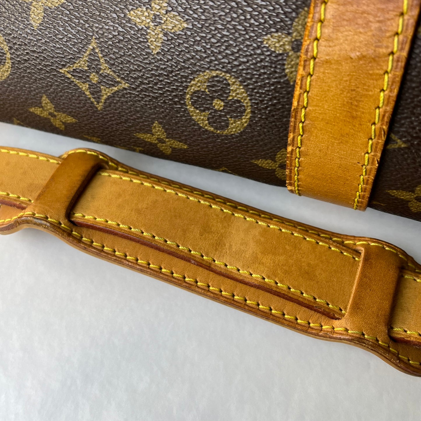 Louis Vuitton Keepall 55 Monogram Canvas – 11.8"H x 21.7"L x 9.4"W