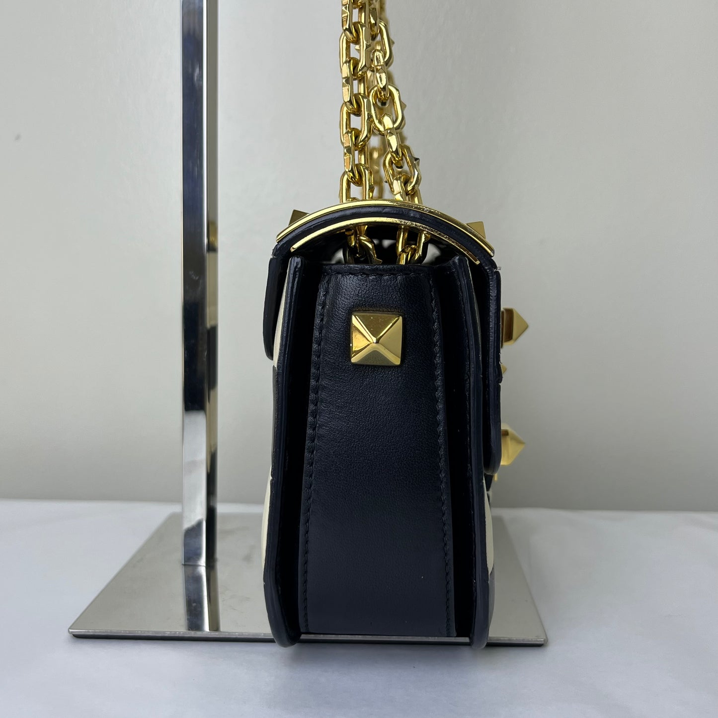 Valentino Nappa Striped Rockstud Black-White – 6.3"H x 9.8"L x 2.8"W