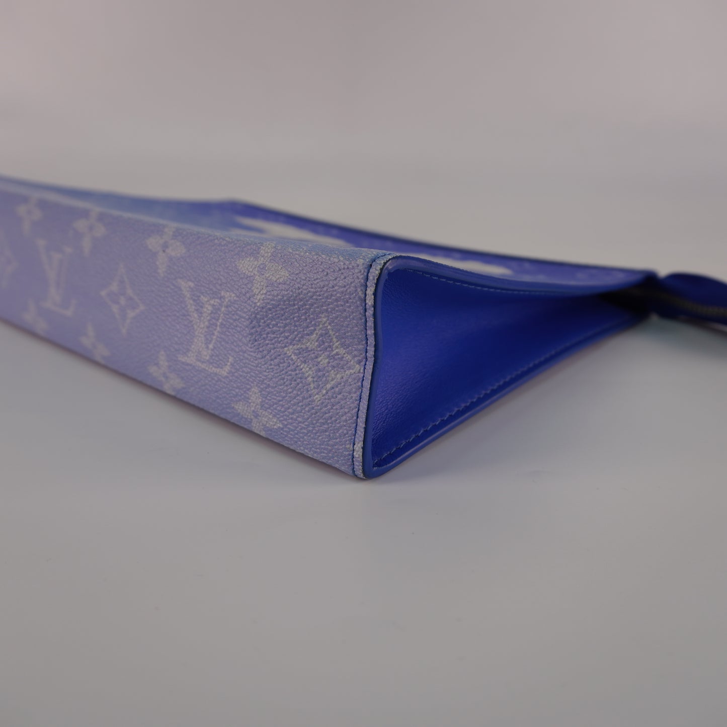 Louis Vuitton	Monogram Clouds Pochette Voyage MM Blue