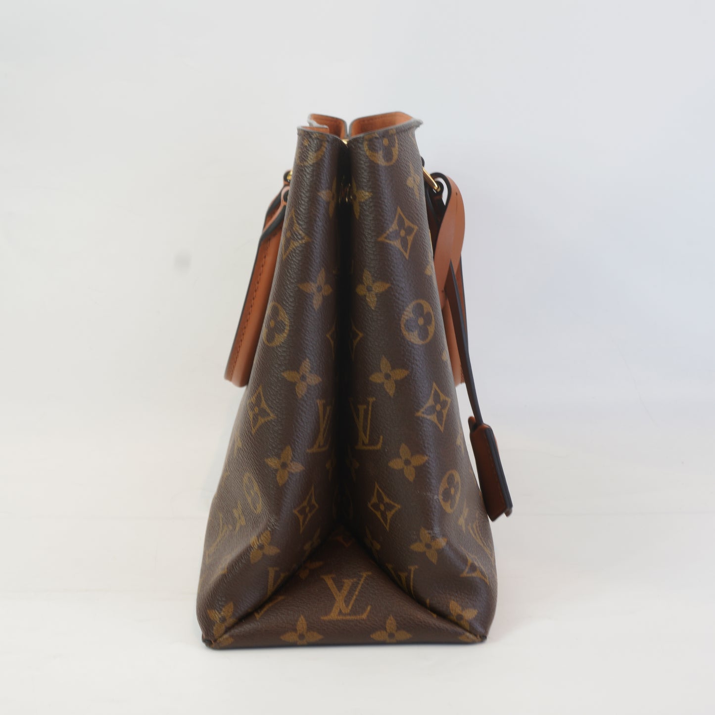 Louis Vuitton	Monogram Canvas Lock Me Tote GHW Medium