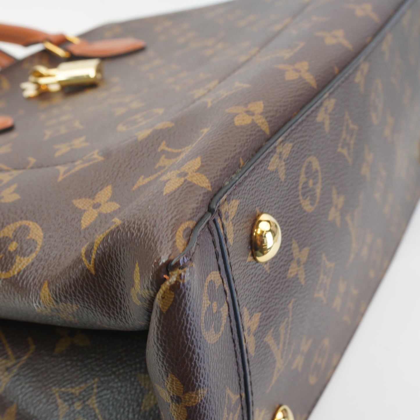 Louis Vuitton	Monogram Canvas Lock Me Tote GHW Medium