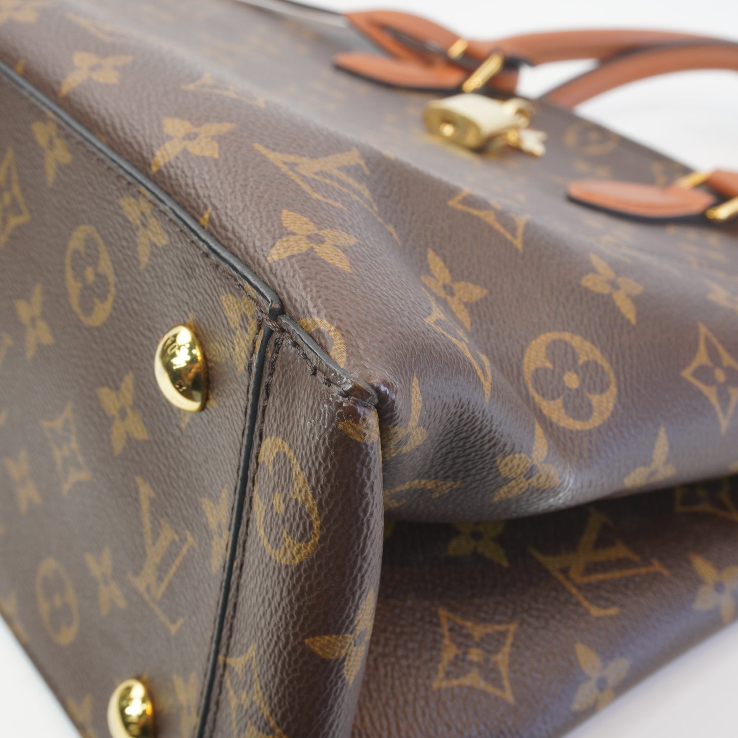 Louis Vuitton	Monogram Canvas Lock Me Tote GHW Medium