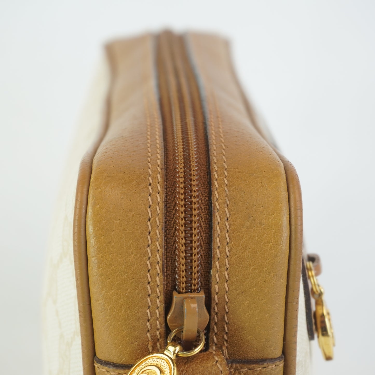 Gucci  GG Mono Coated Canvas Clutch