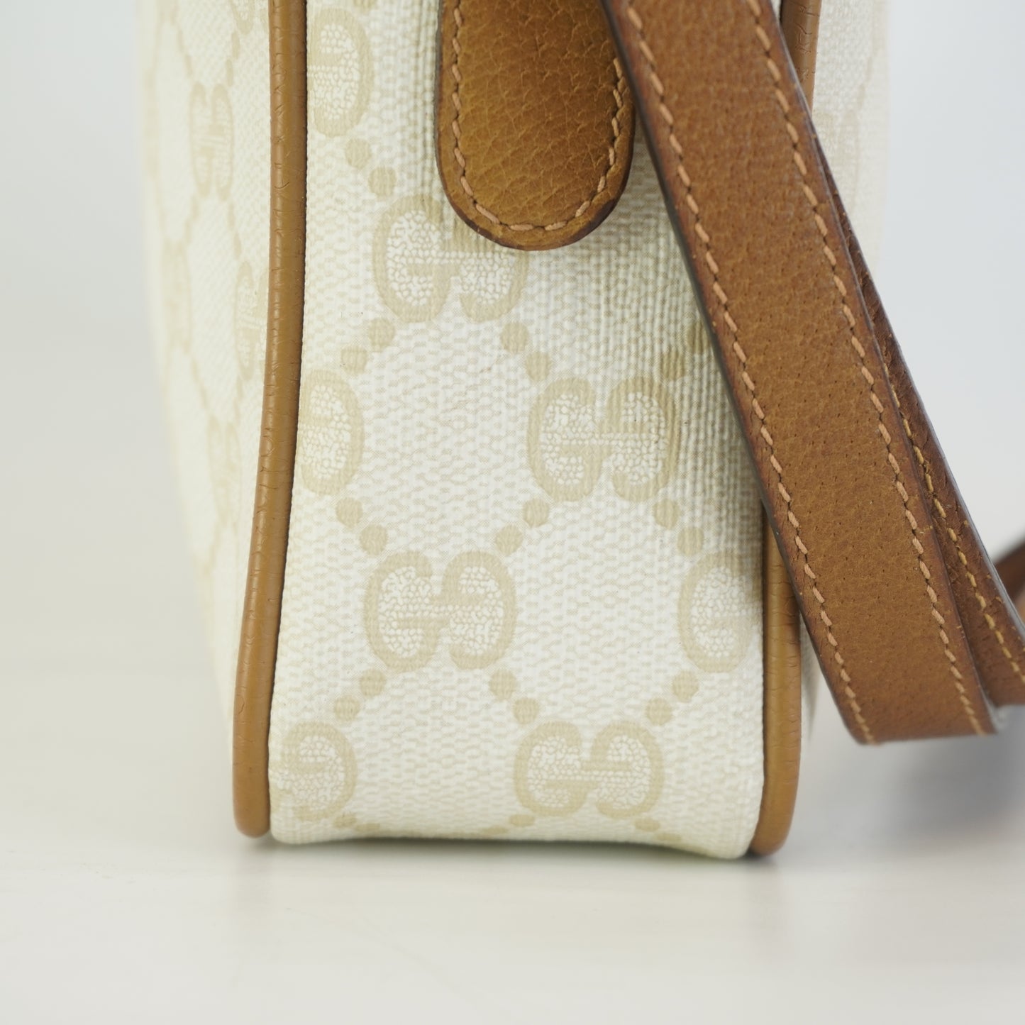 Gucci  GG Mono Coated Canvas Clutch