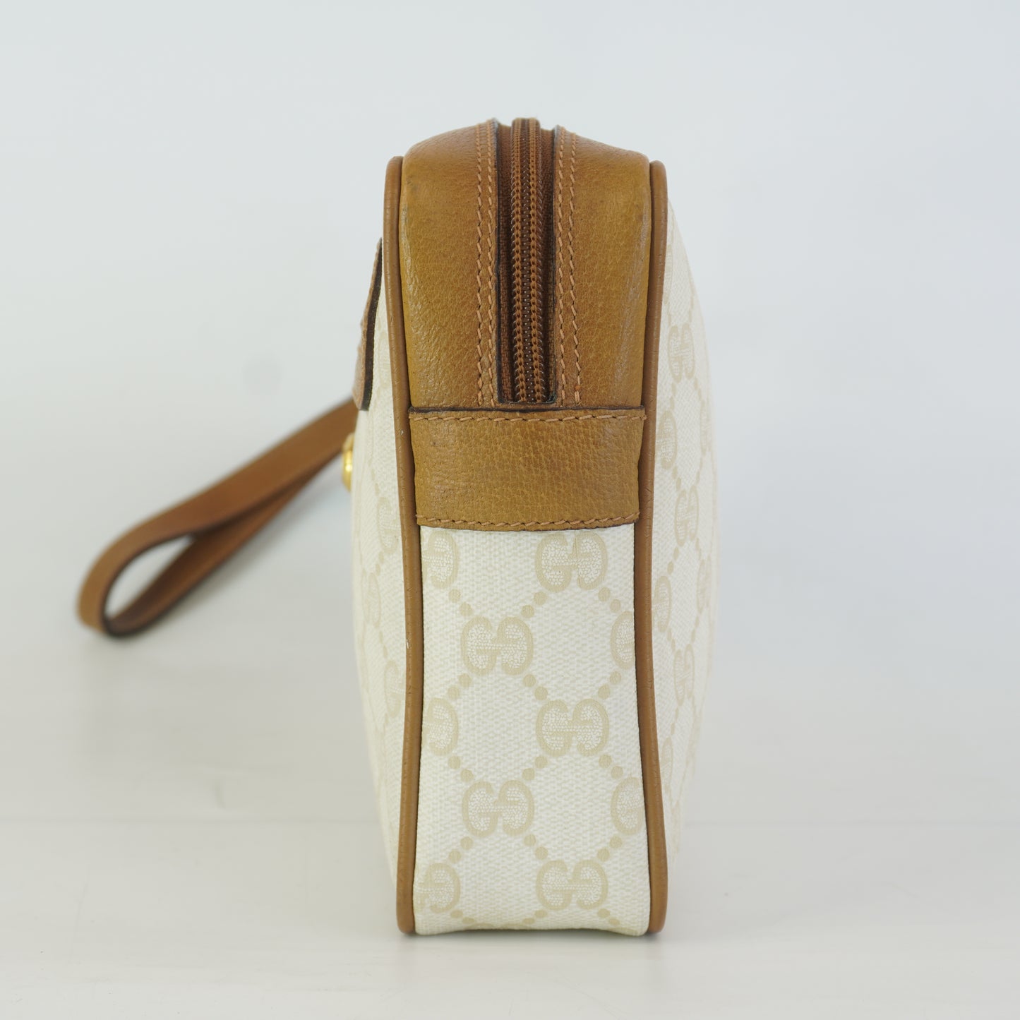 Gucci  GG Mono Coated Canvas Clutch