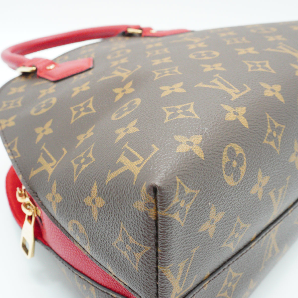Louis Vuitton	Alma BNB Medium Handbag Monogram Red Trims GHW
