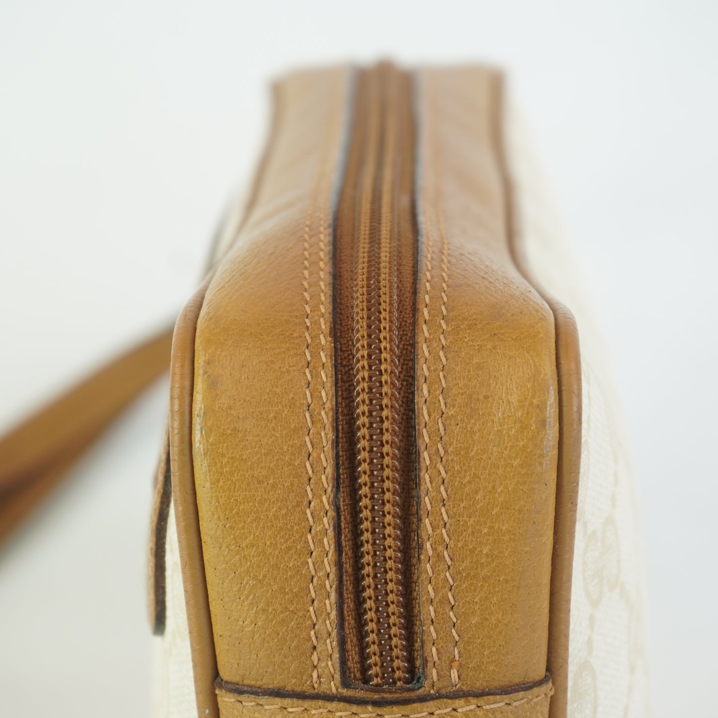 Gucci  GG Mono Coated Canvas Clutch