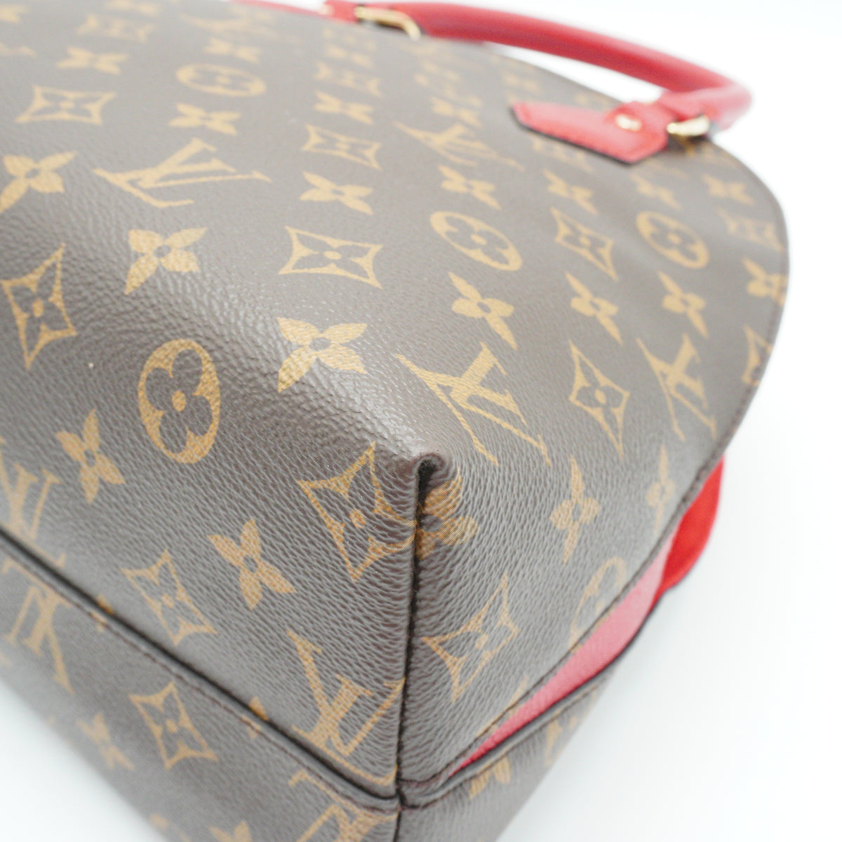Louis Vuitton	Alma BNB Medium Handbag Monogram Red Trims GHW