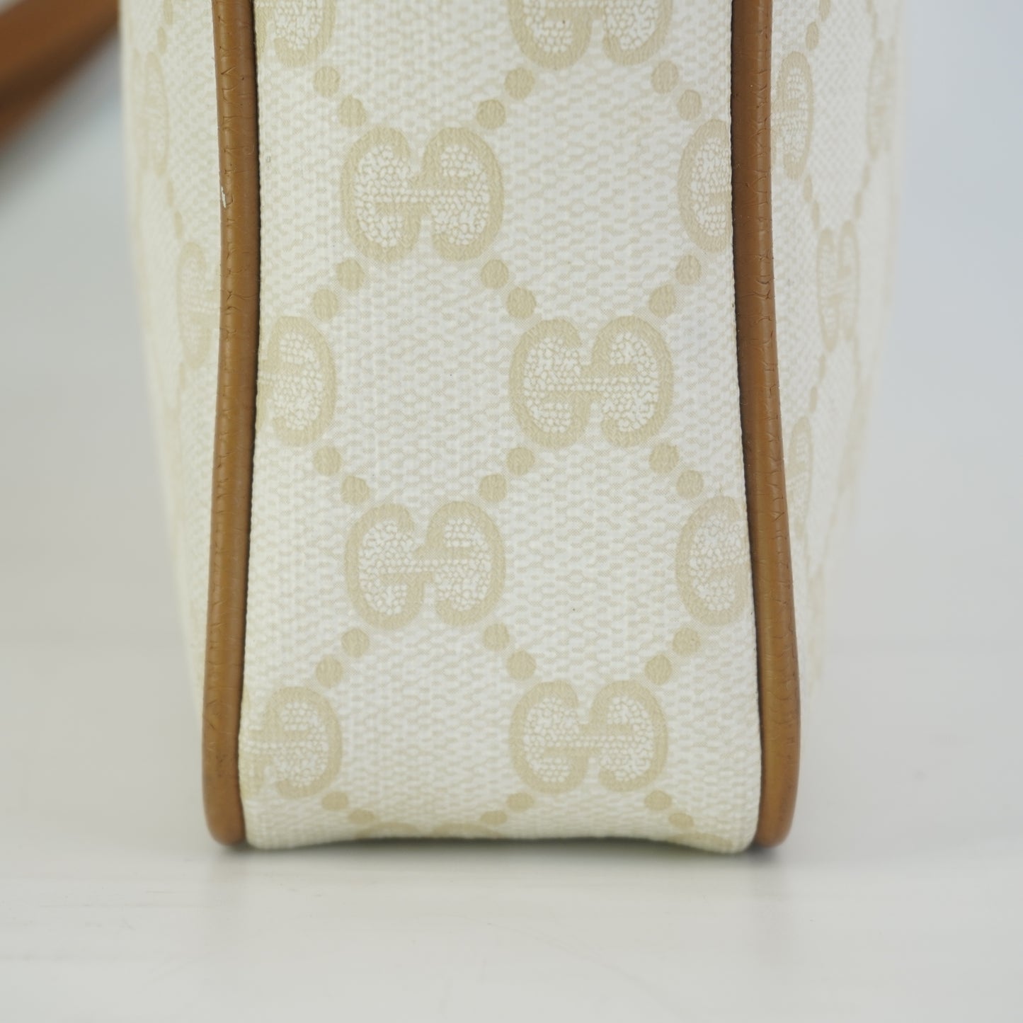 Gucci  GG Mono Coated Canvas Clutch