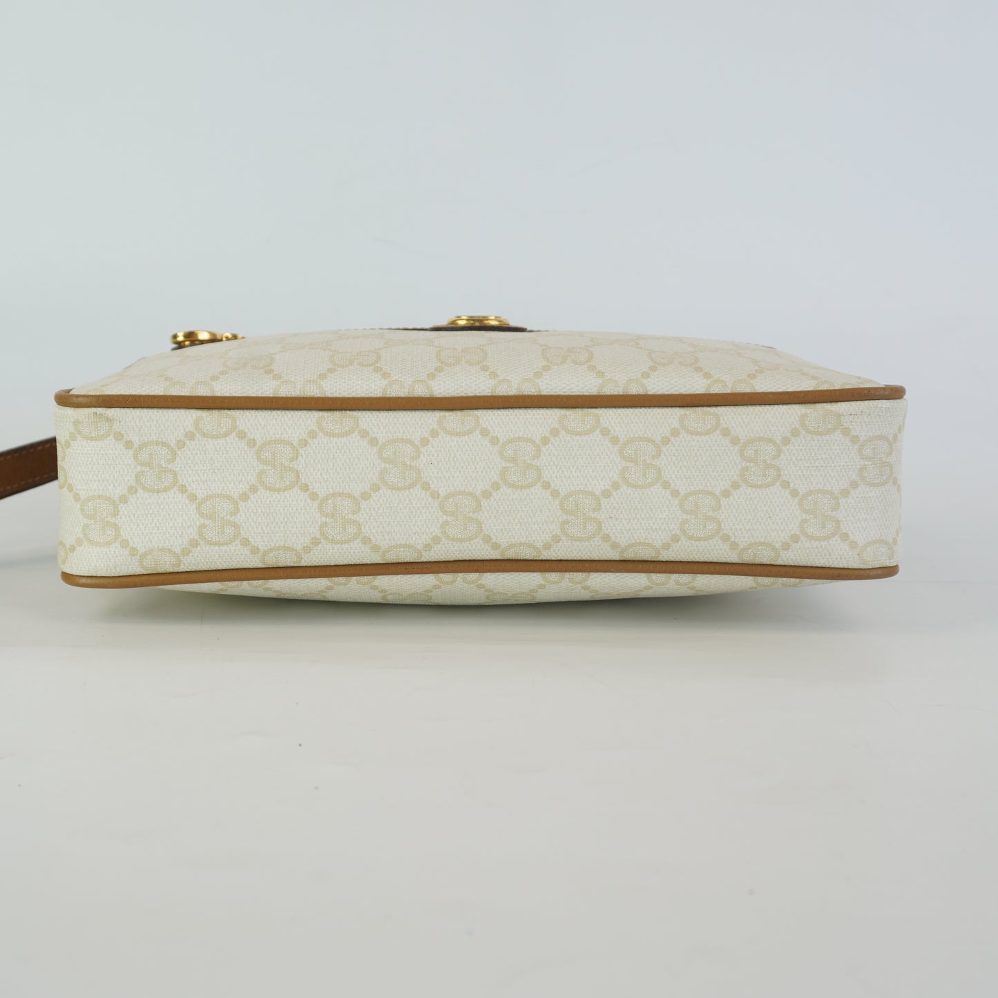 Gucci  GG Mono Coated Canvas Clutch
