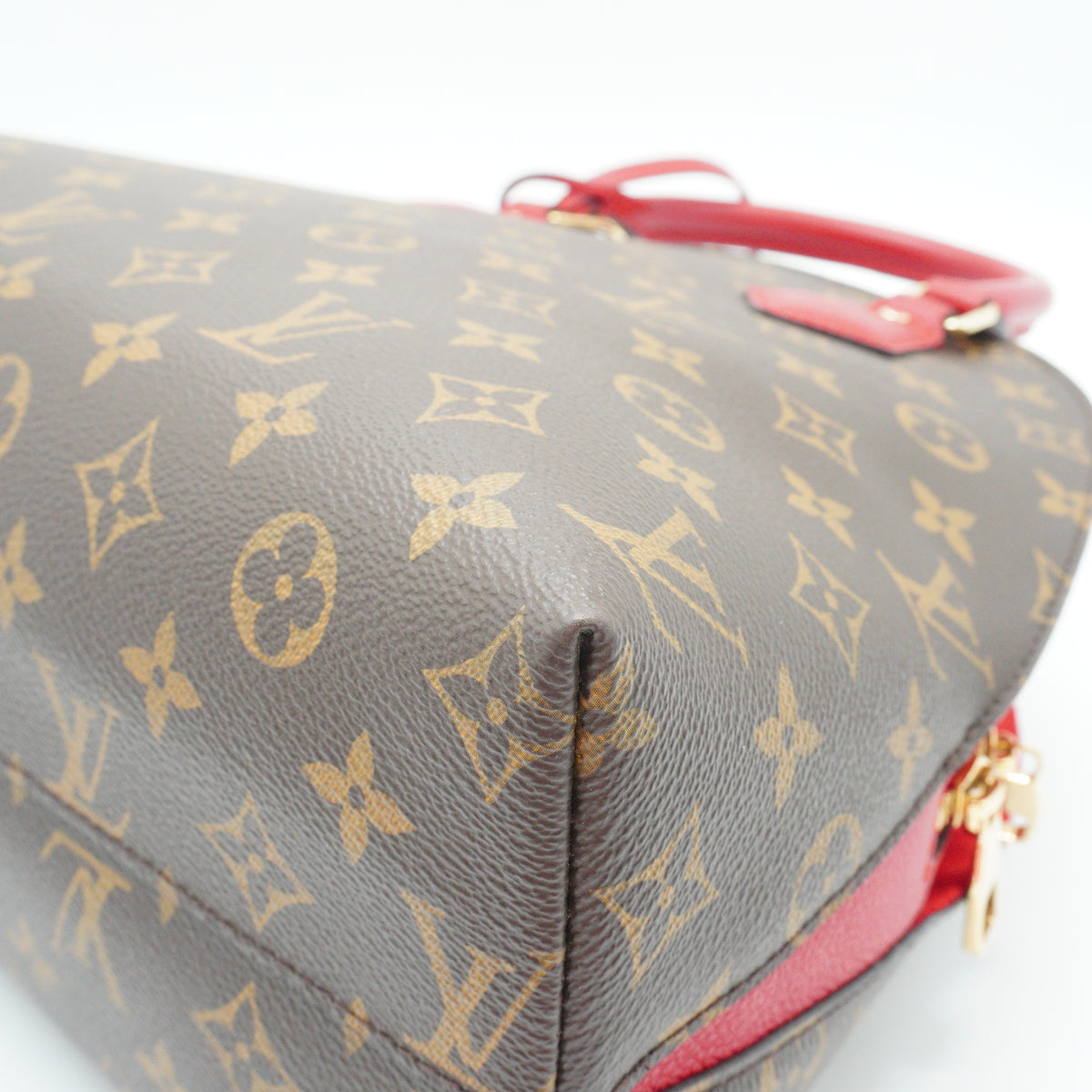 Louis Vuitton	Alma BNB Medium Handbag Monogram Red Trims GHW