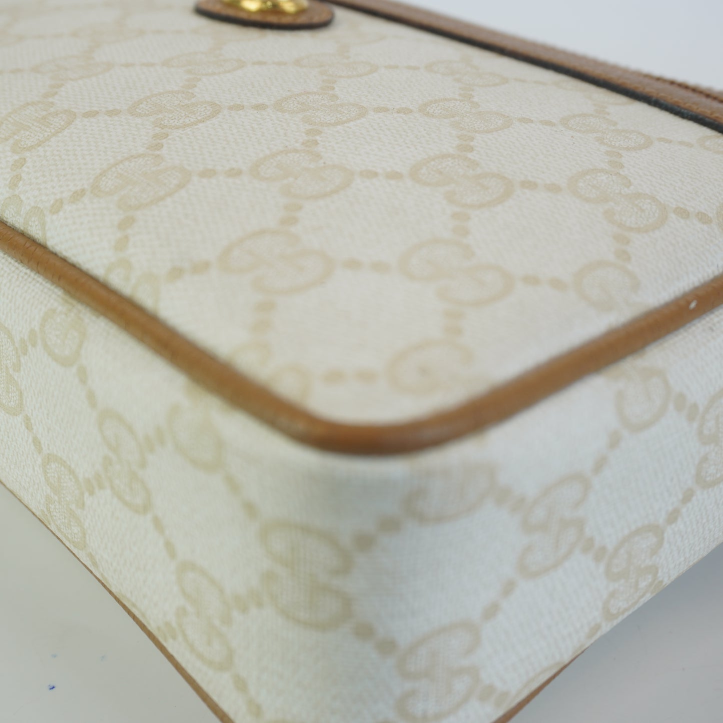 Gucci  GG Mono Coated Canvas Clutch
