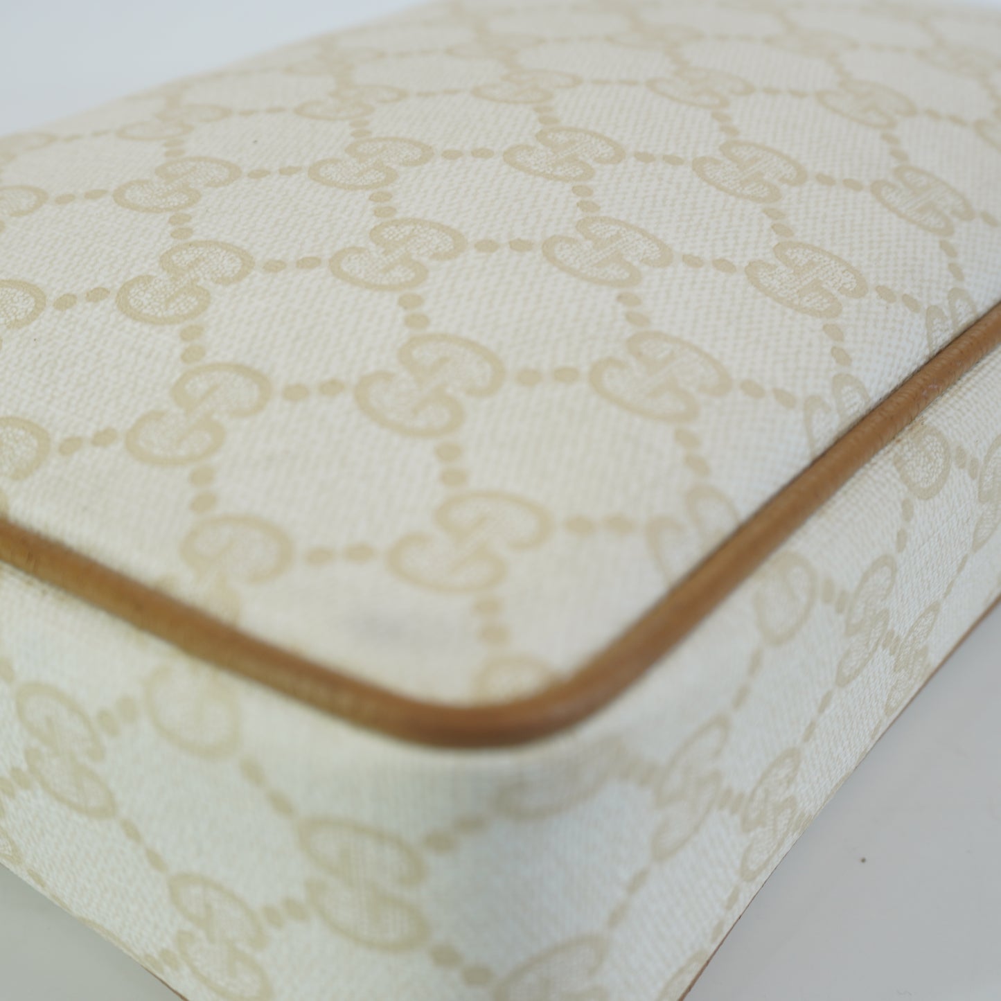 Gucci  GG Mono Coated Canvas Clutch