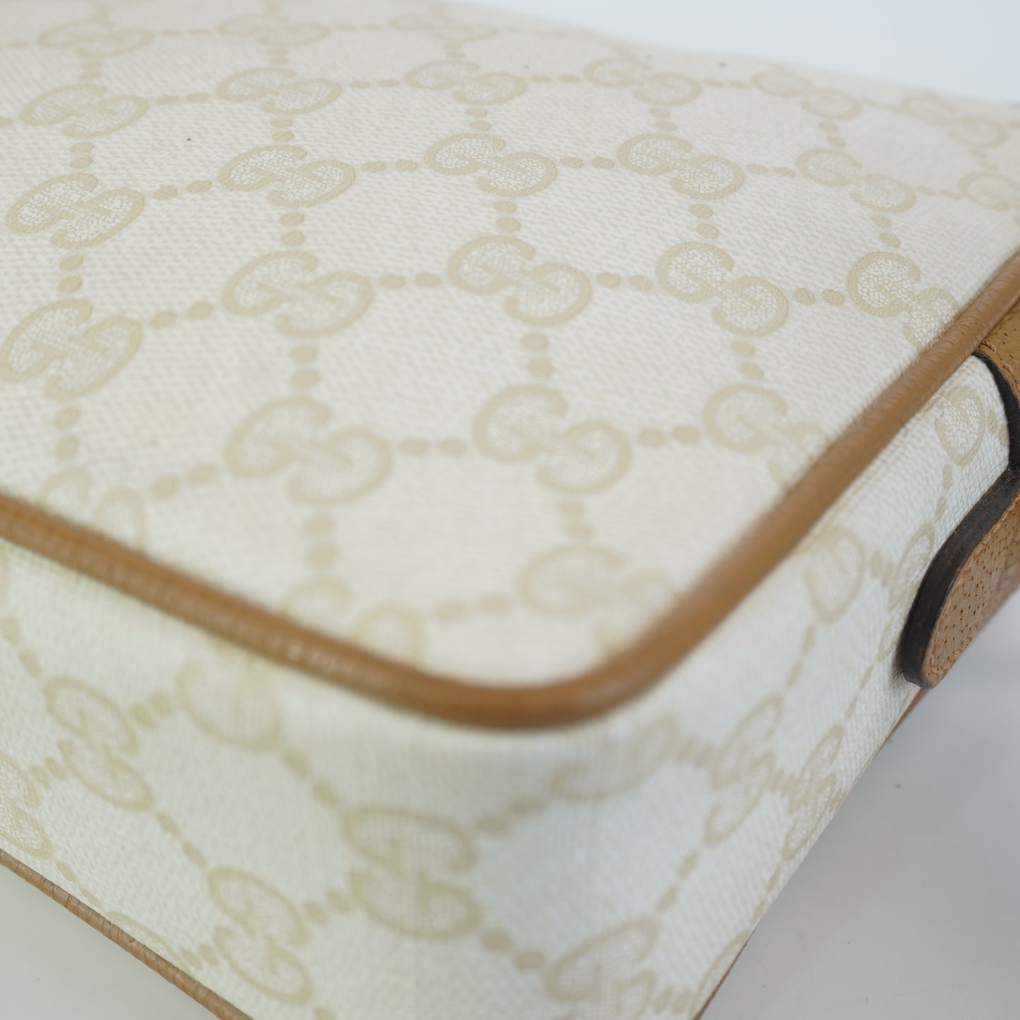 Gucci  GG Mono Coated Canvas Clutch