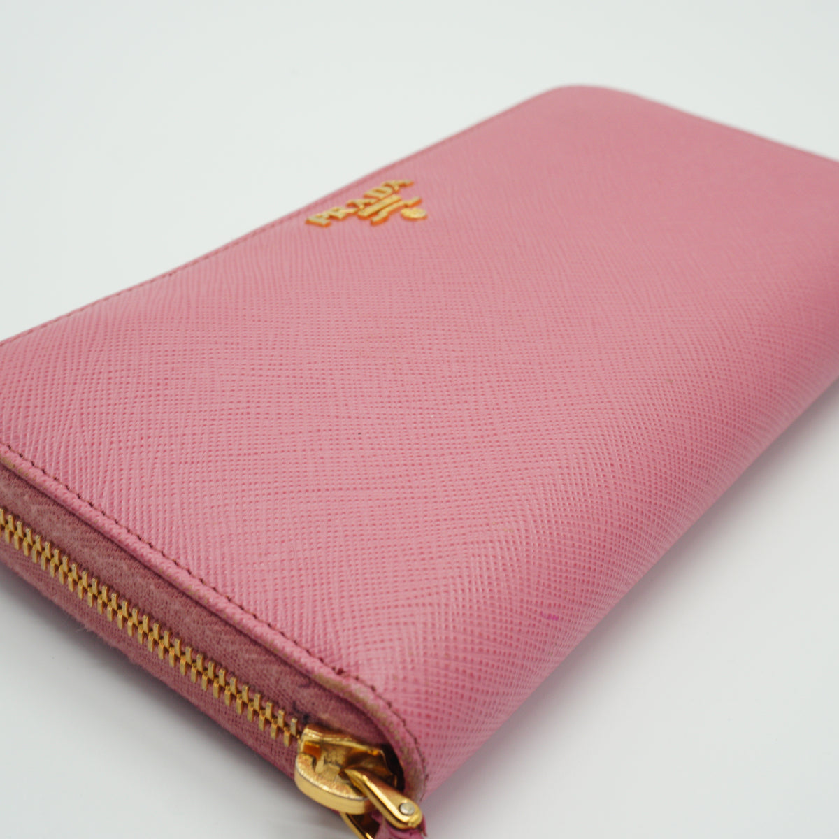 Prada Saffiano leather long zip around wallet pink