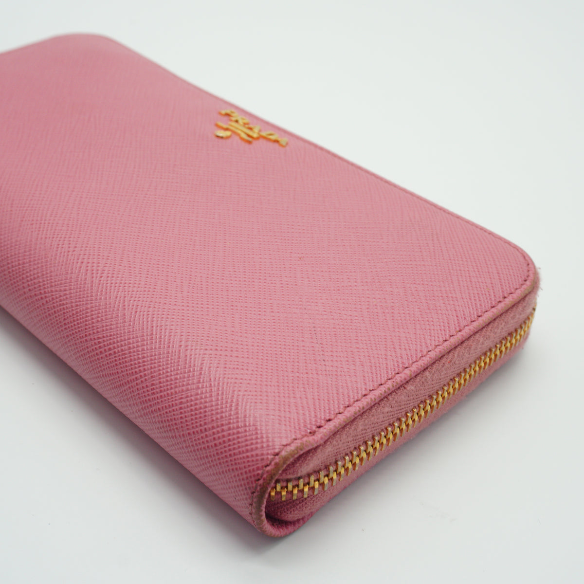 Prada Saffiano leather long zip around wallet pink