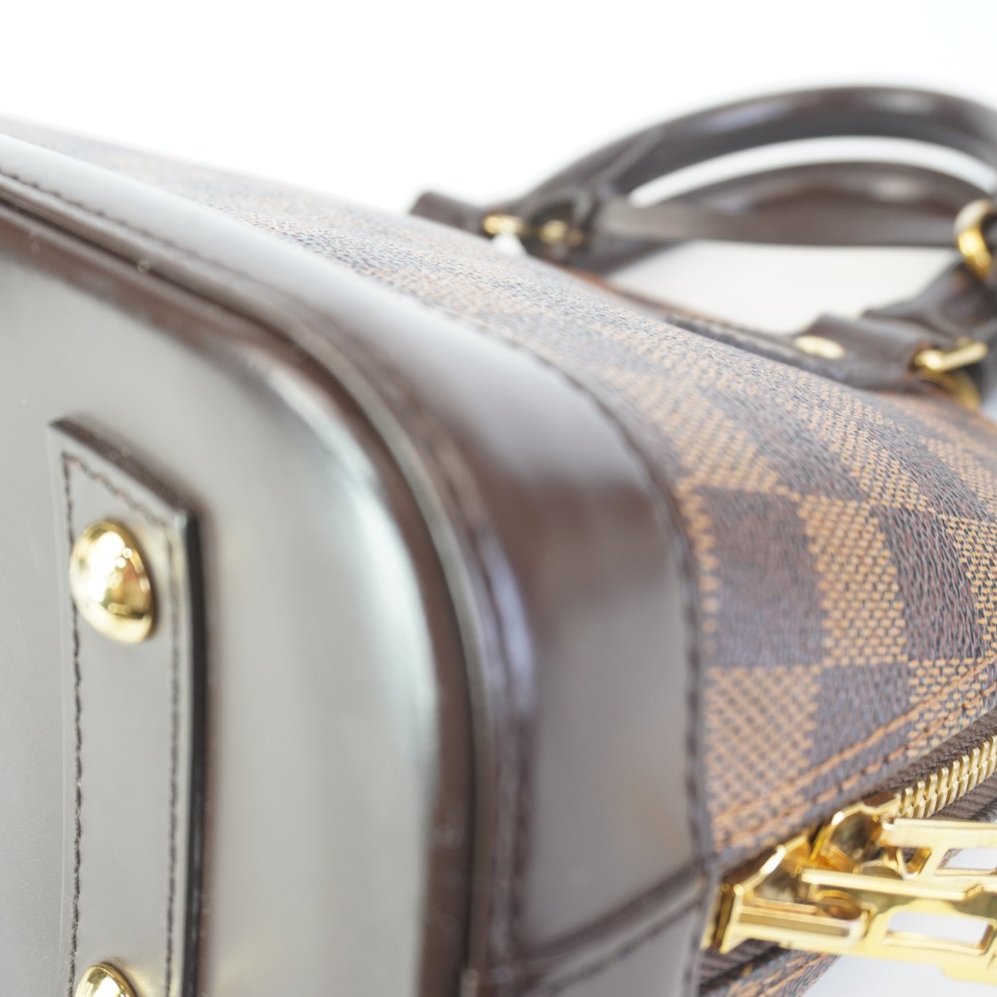 Louis Vuitton	Alma BB Damier Ebene Canvas GHW