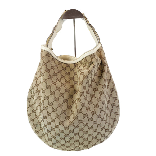 Gucci Monogram Luggage Wave Hobo