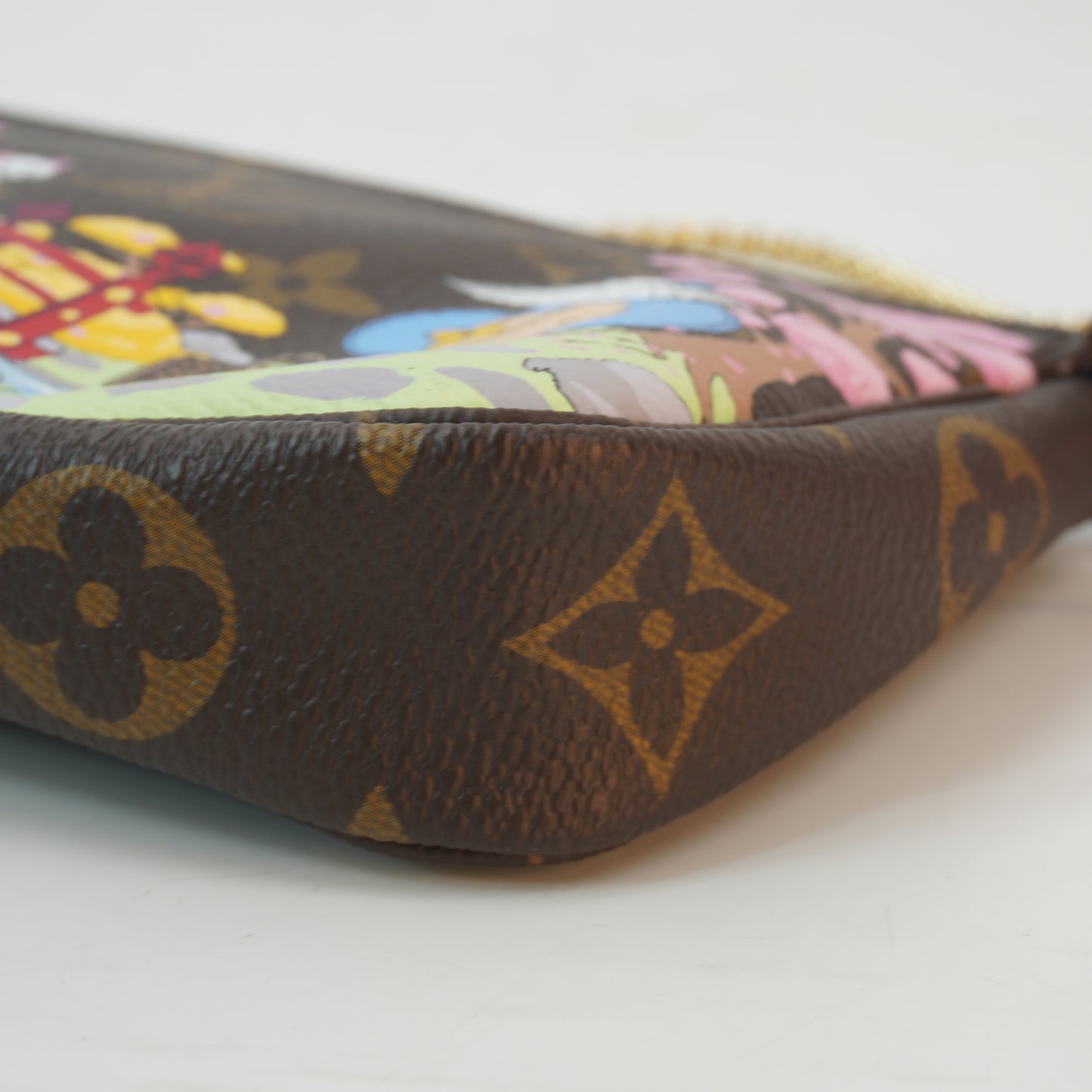 Louis Vuitton	Monogram Garden Mini Pochette
