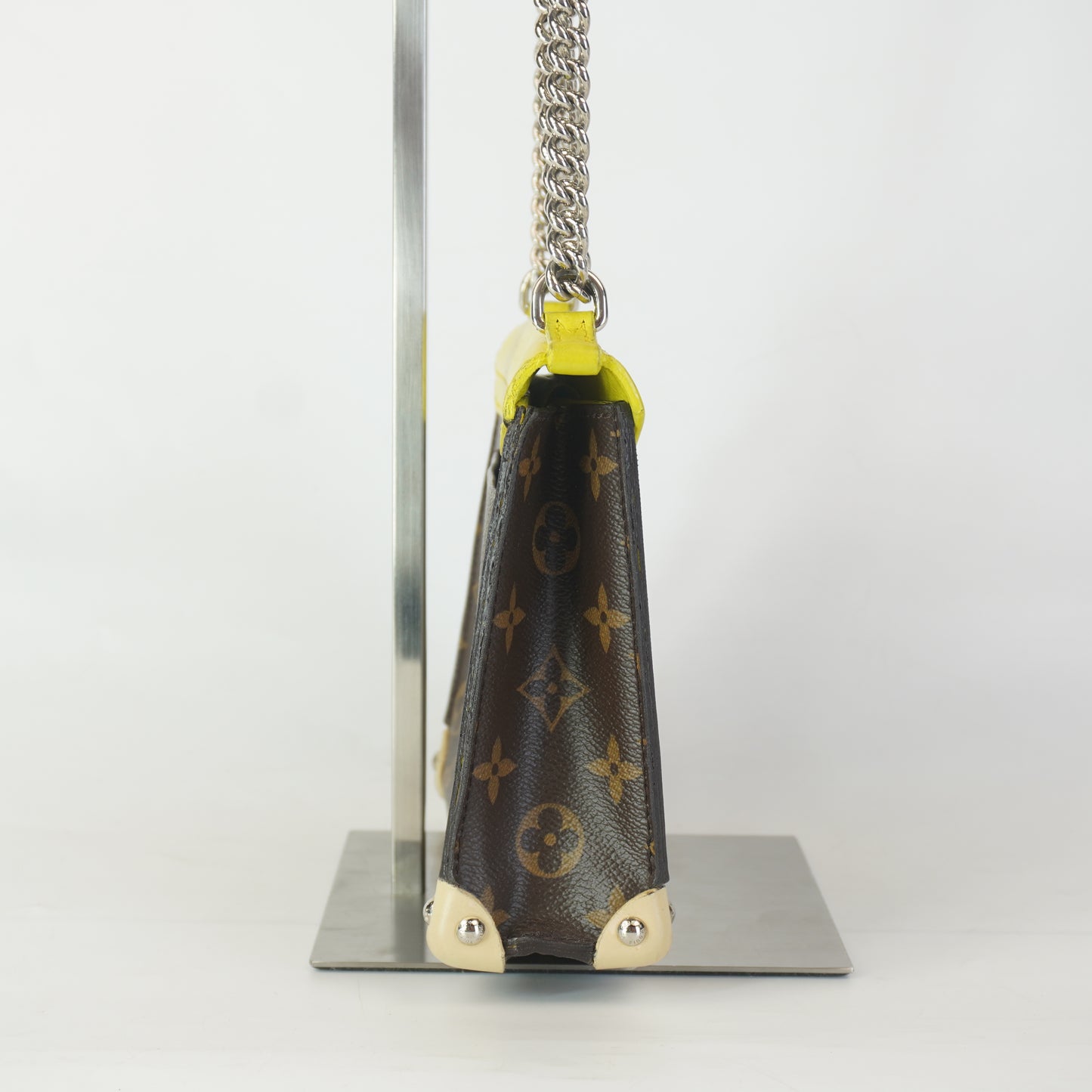 Louis Vuitton	Tribal Mask Pochette Monogram Yellow Trims