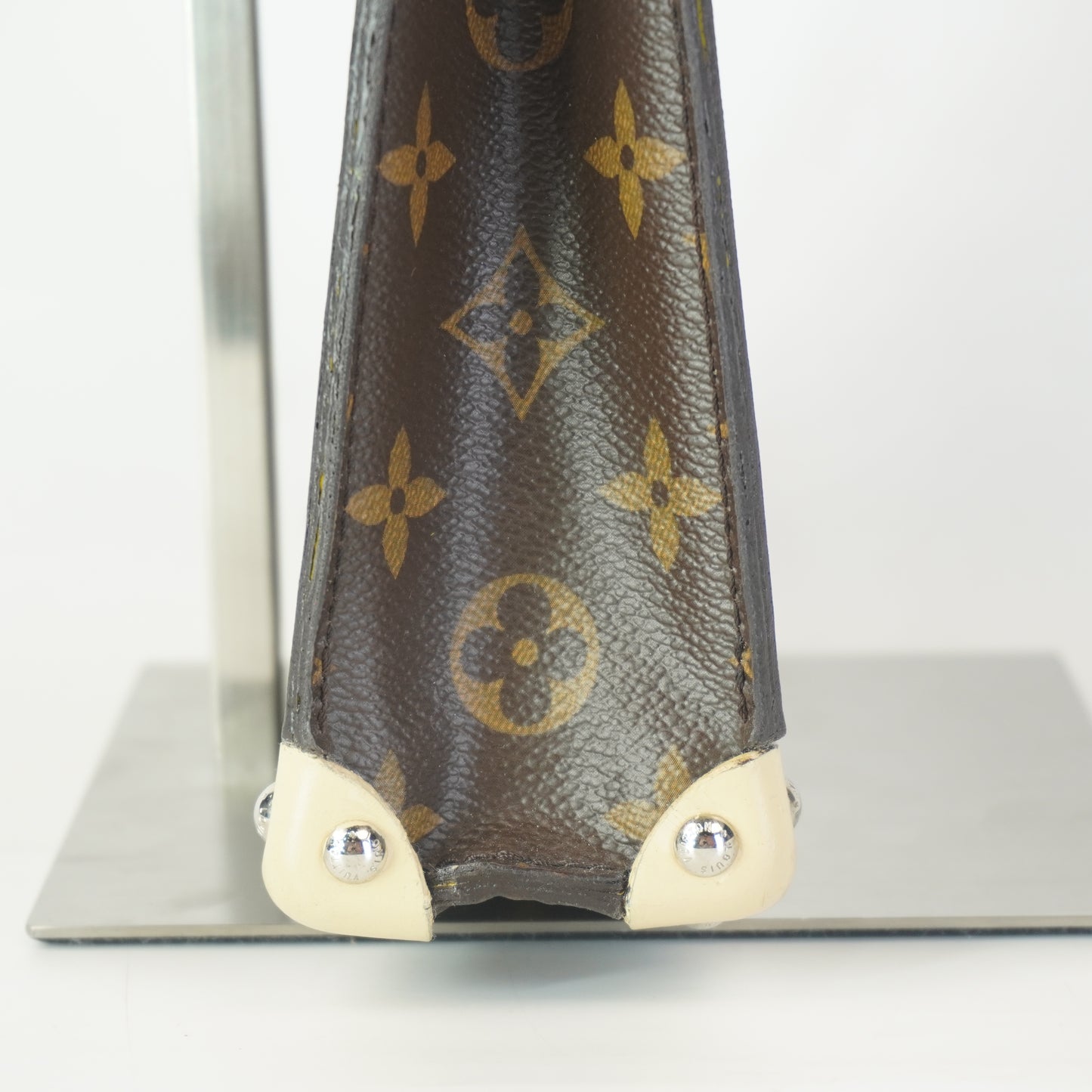 Louis Vuitton	Tribal Mask Pochette Monogram Yellow Trims