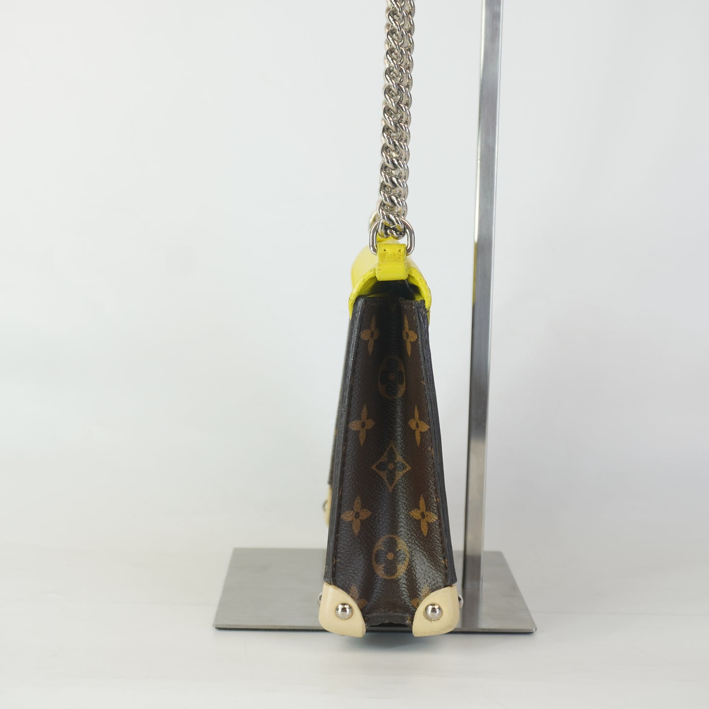 Louis Vuitton	Tribal Mask Pochette Monogram Yellow Trims