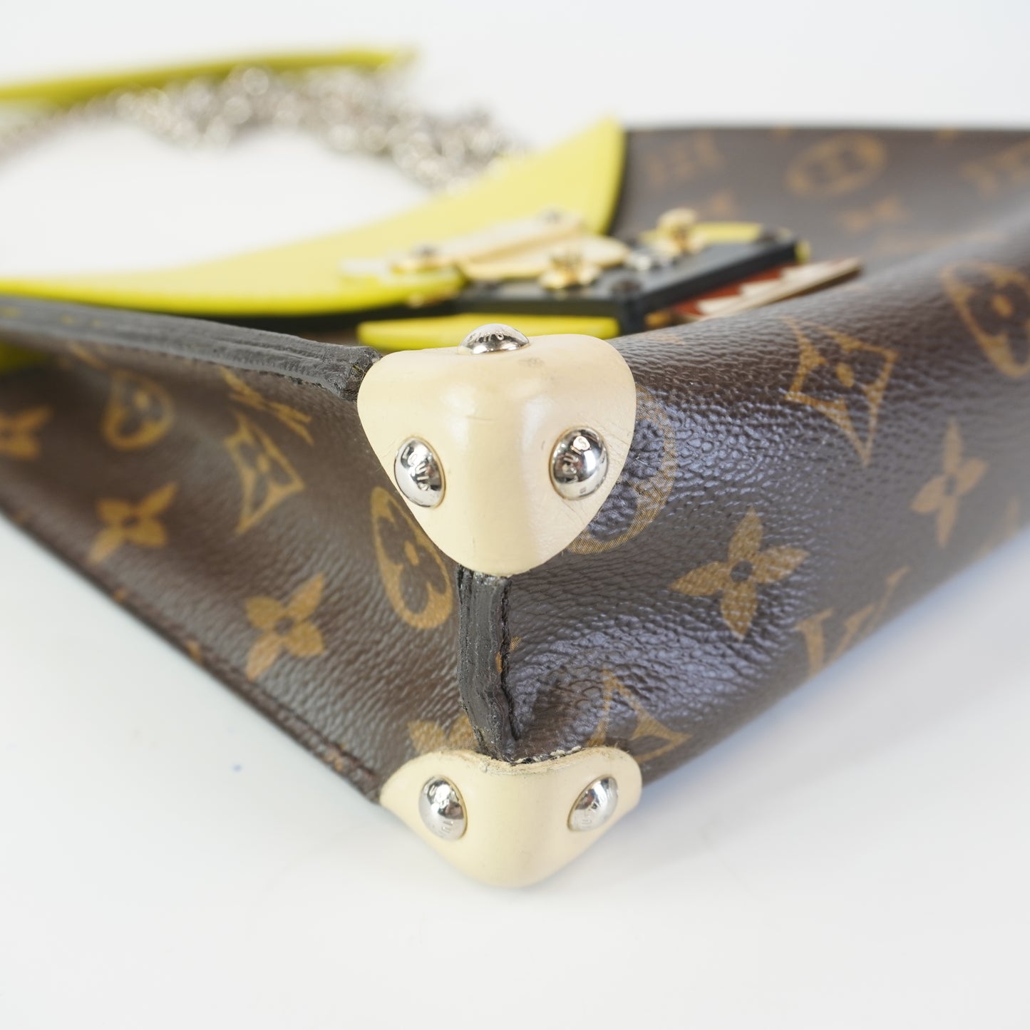 Louis Vuitton	Tribal Mask Pochette Monogram Yellow Trims