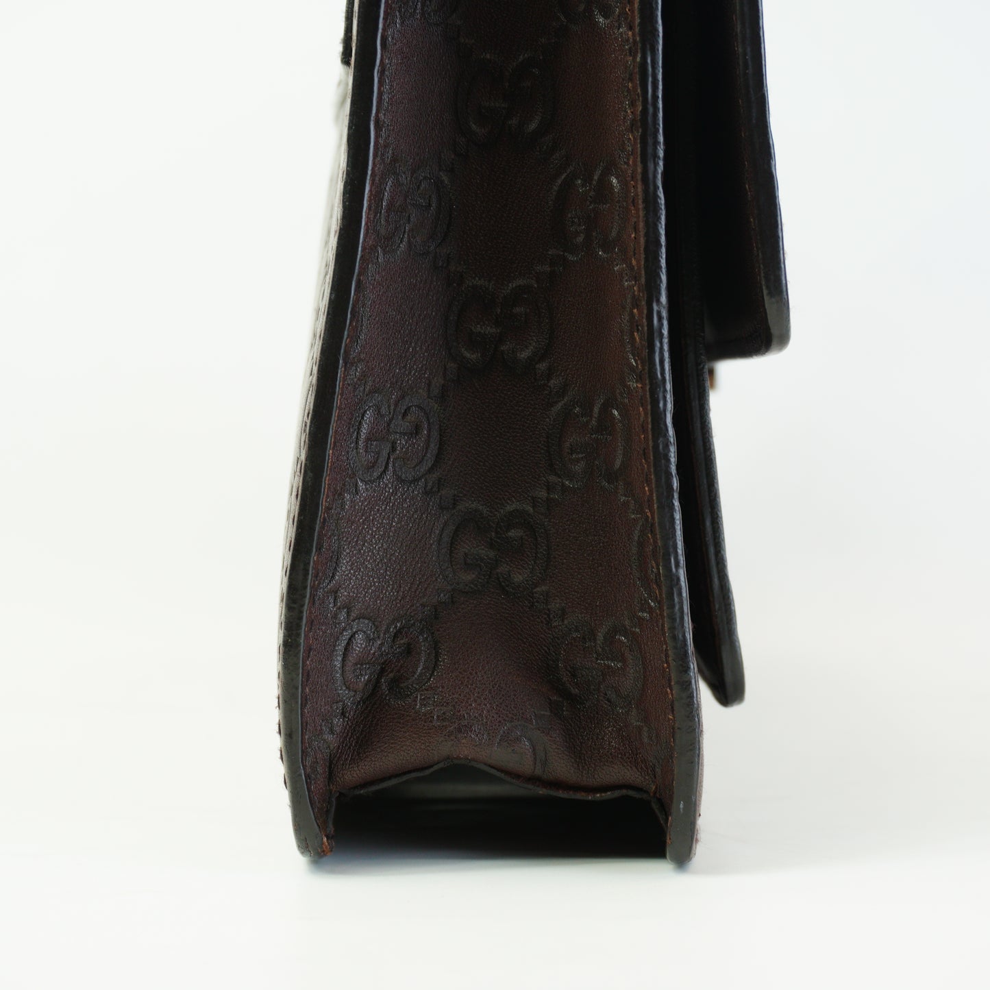Gucci	Guccissima Leather Clutch Medium Brown SHW