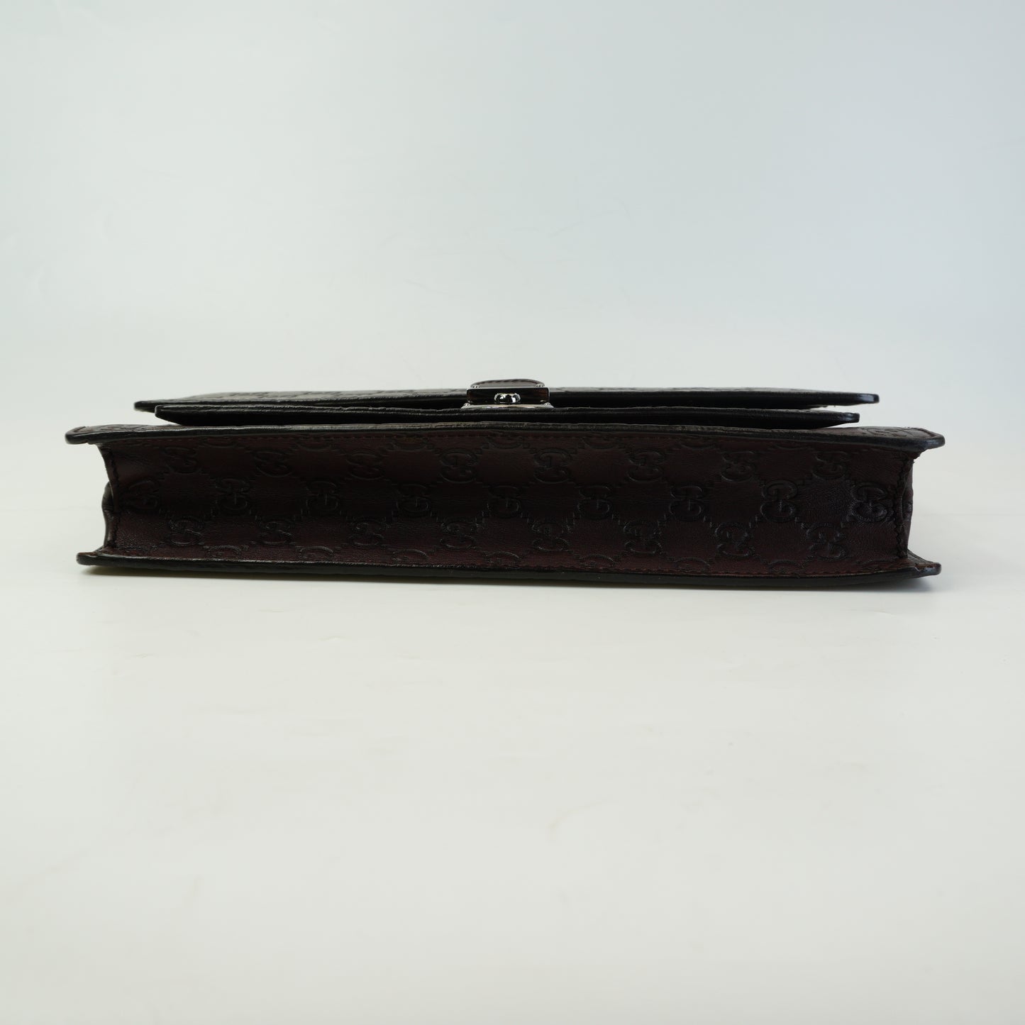 Gucci	Guccissima Leather Clutch Medium Brown SHW