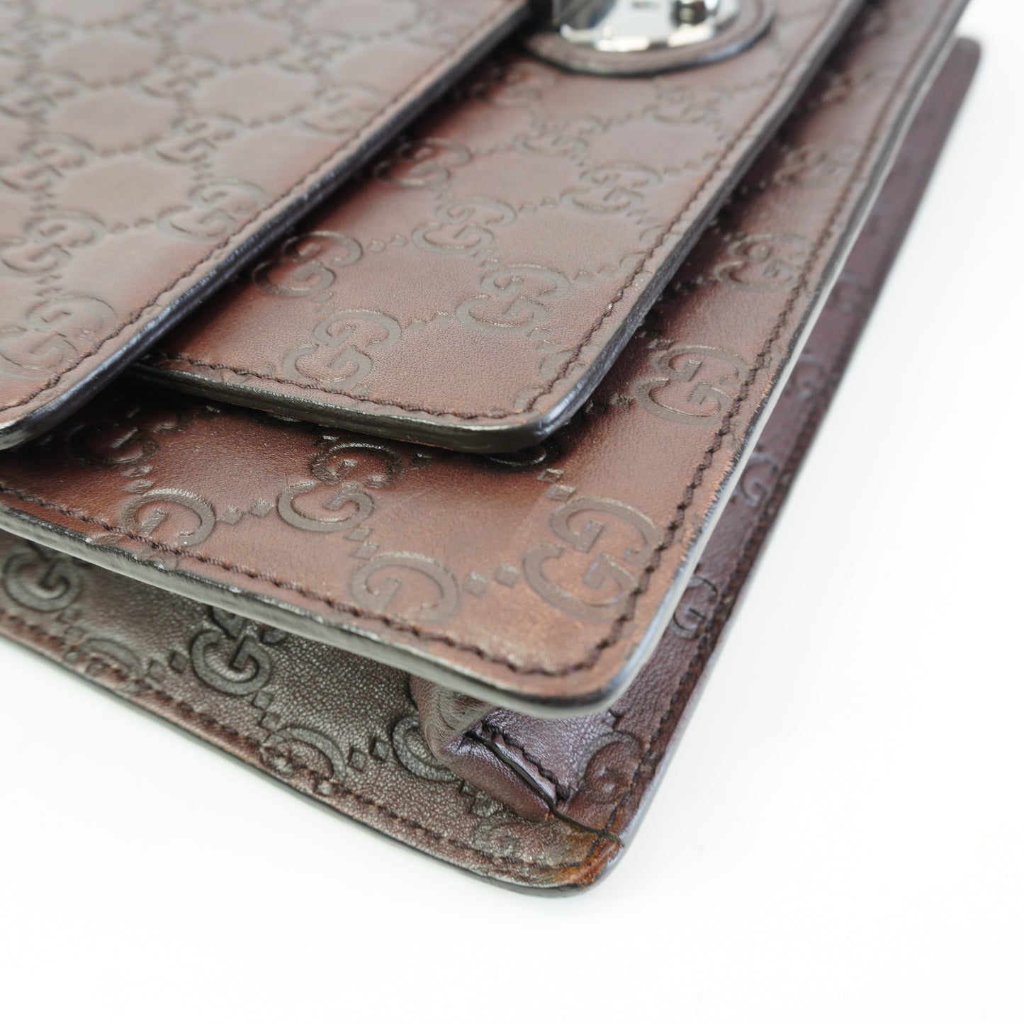 Gucci	Guccissima Leather Clutch Medium Brown SHW