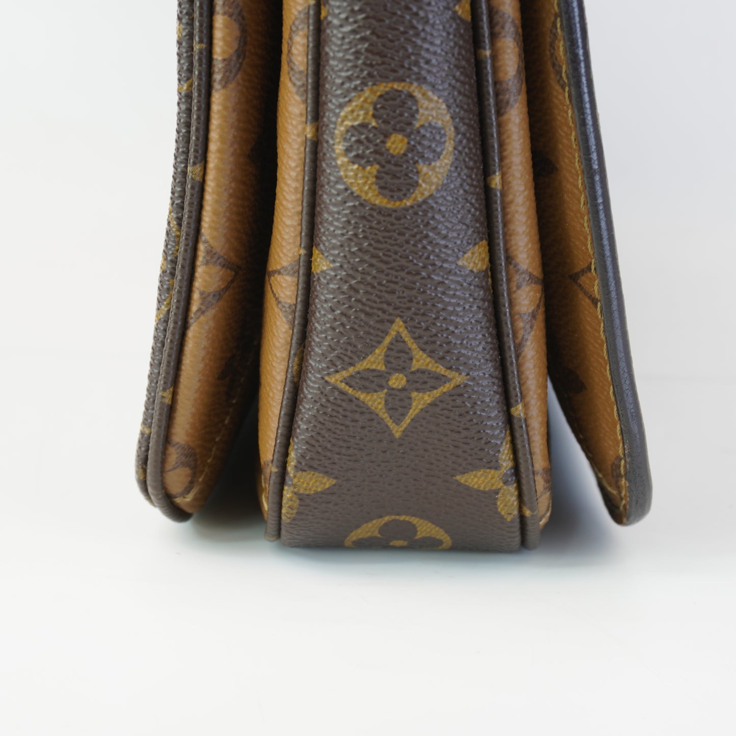 Louis Vuitton	Pochette Metis Reverse Mono Canvas