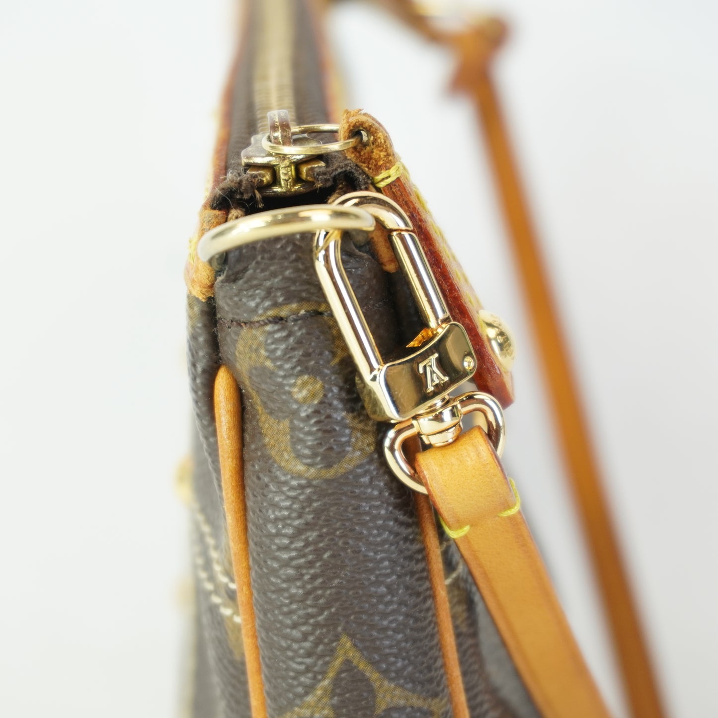 Louis Vuitton	Limited Edition Mono Canvas Pochette