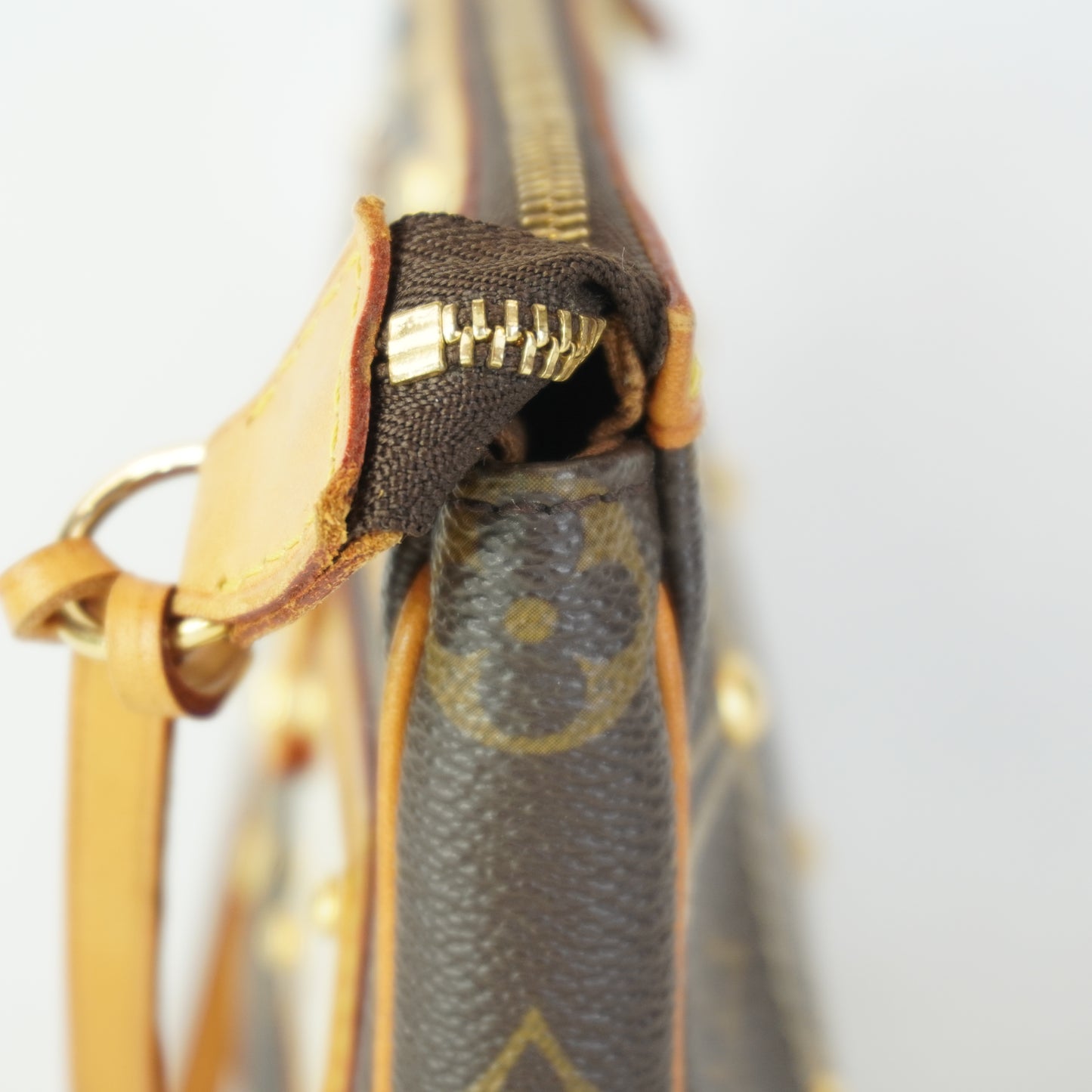 Louis Vuitton	Limited Edition Mono Canvas Pochette